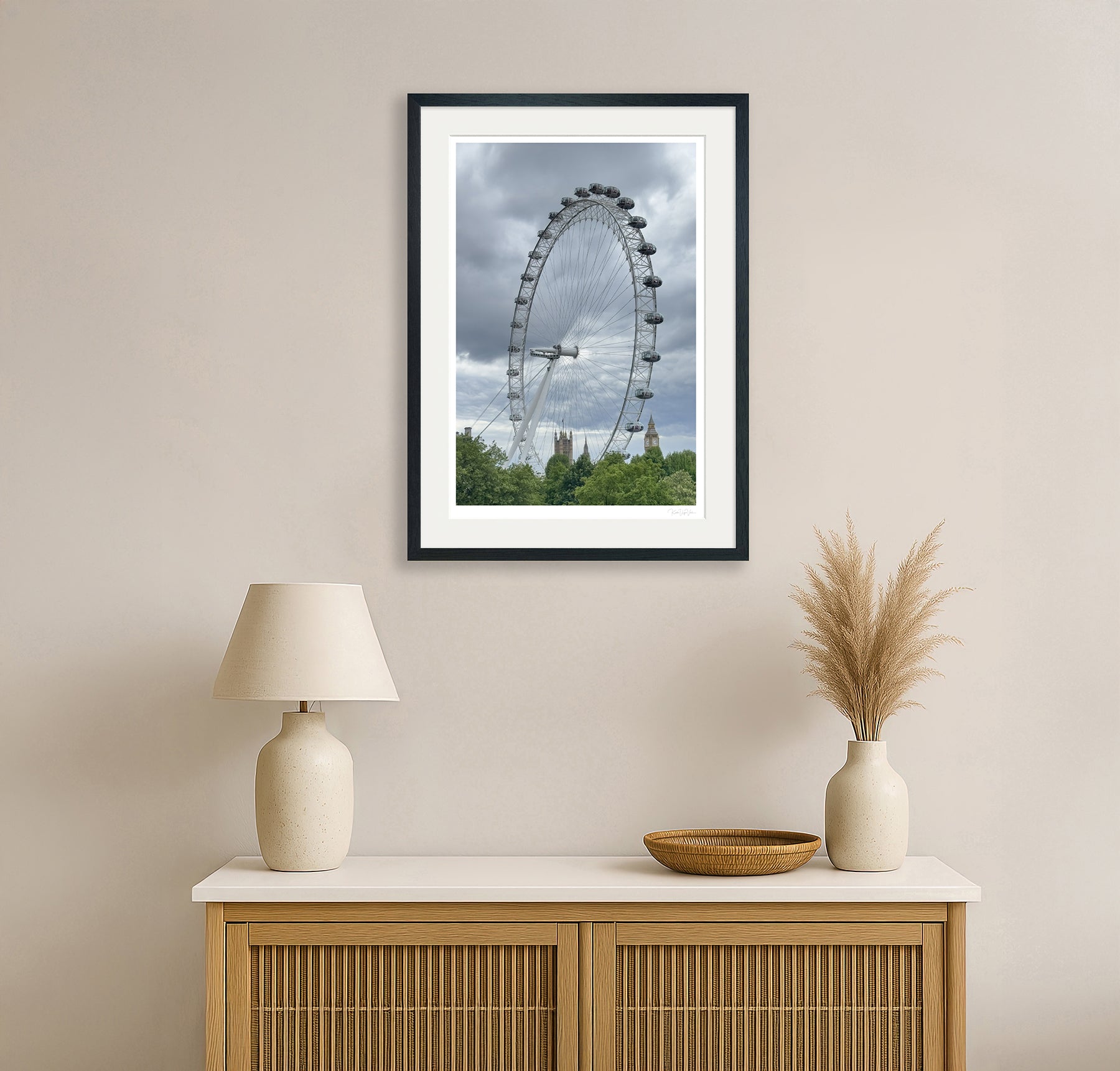 Living room decor showing framed London Eye wall art with black frame