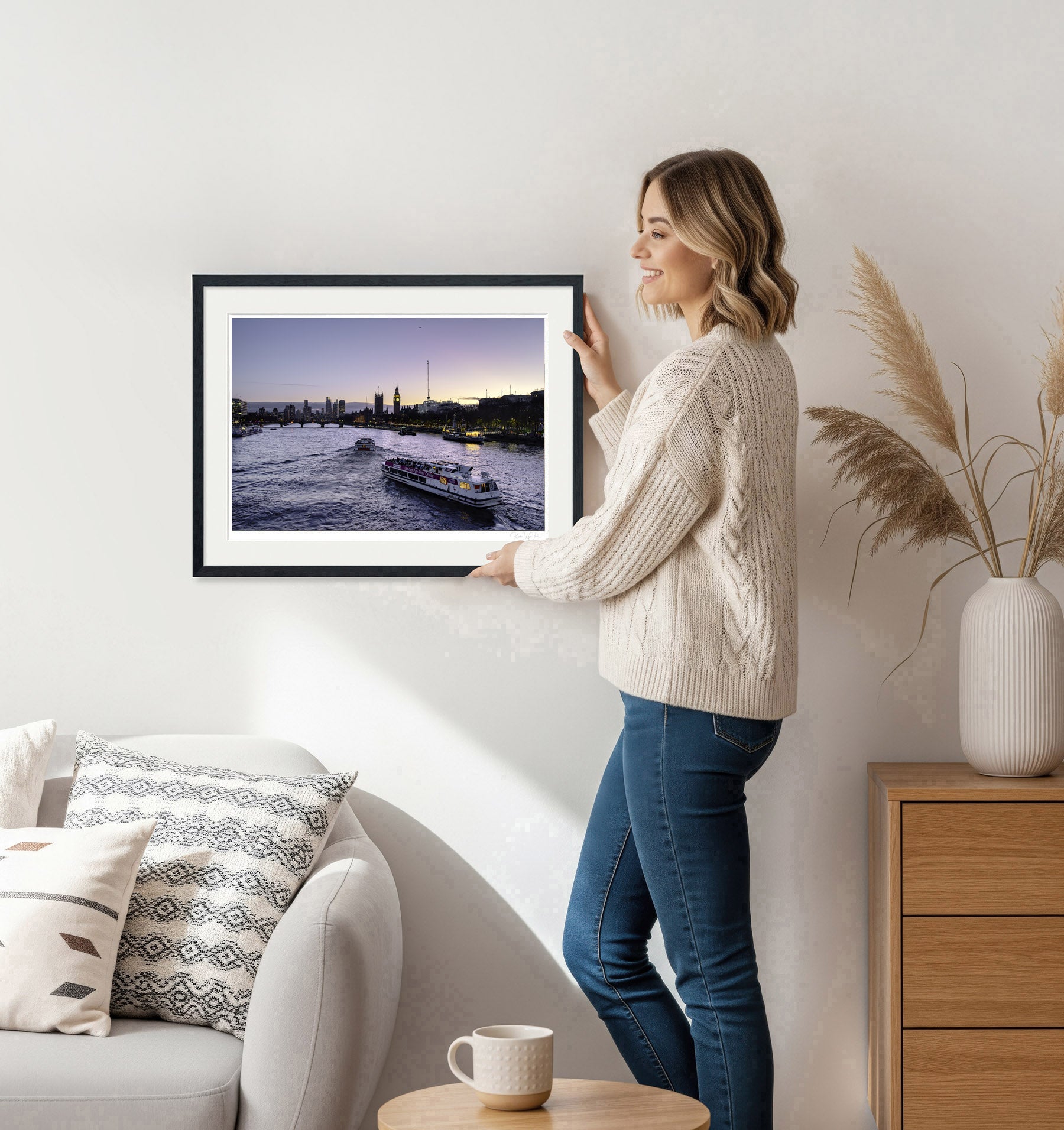 Woman Holding Framed Big Ben Sunset Wall Art – Black Frame with Museum-Grade Finishing