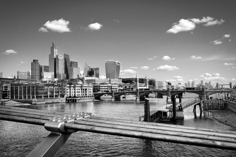 View east from Millennium Bridge with steel cables in the foreground, Blackfriars Bridge, City of London skyline including the Walkie Talkie and Cheesegrater, and Tower Bridge in the distance, black and white fine art print