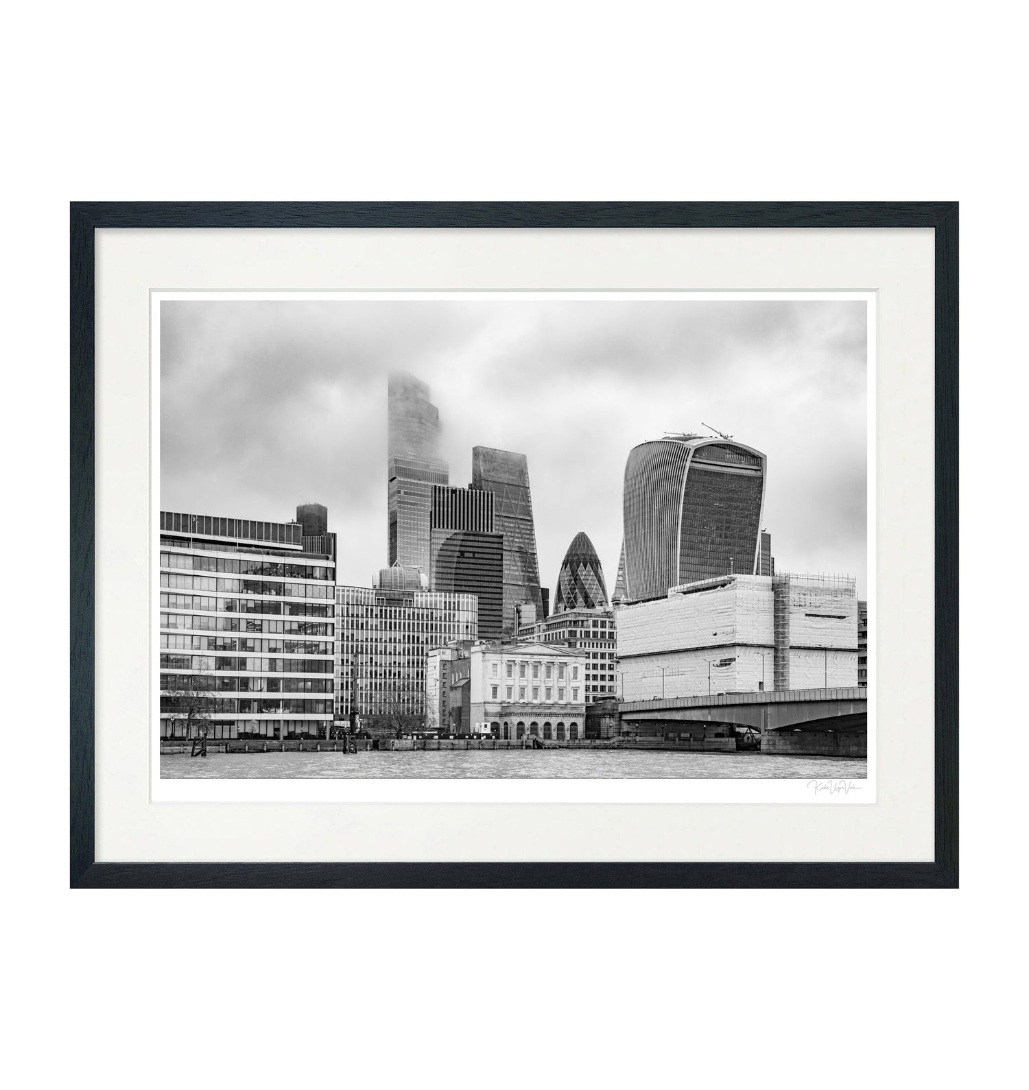 Framed black and white London skyline fine art print with modern architectural landmarks like The Gherkin and Walkie Talkie, presented in a minimalist frame with passepartout, ideal for contemporary interiors.