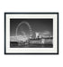 Black and white London Eye fine art print displayed with white passepartout and black frame – museum-quality wall art