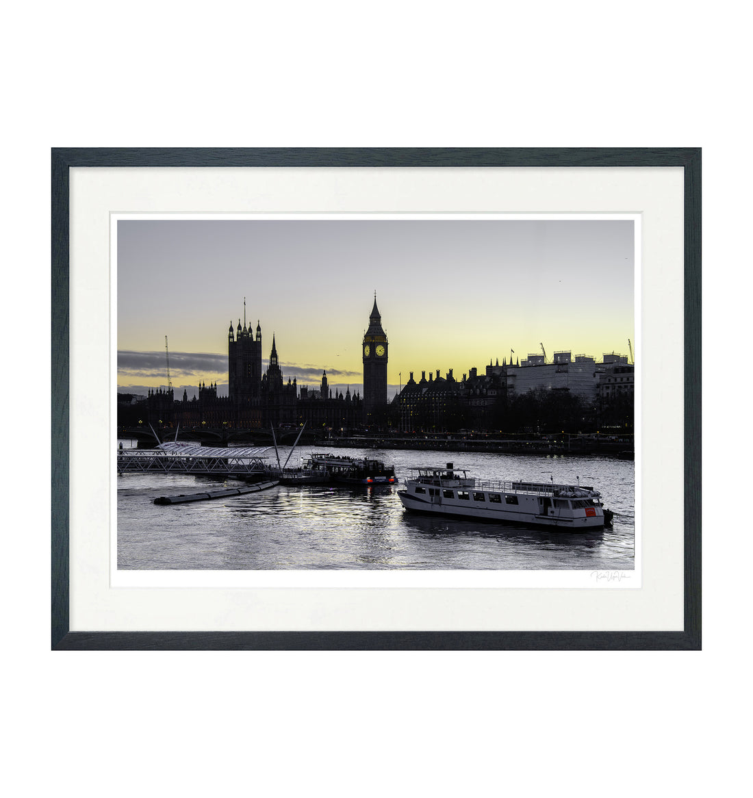 Framed wall art of Big Ben and Parliament in London at sunset, mounted on white passepartout with black wooden frame

