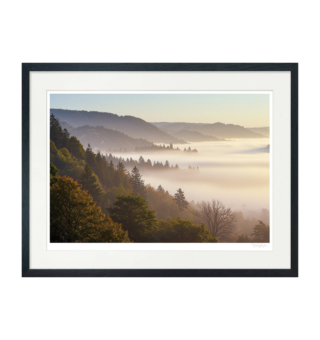 Misty mountain valley and pine forest wall art framed in black wood with white mount – generative art print on Hahnemühle paper