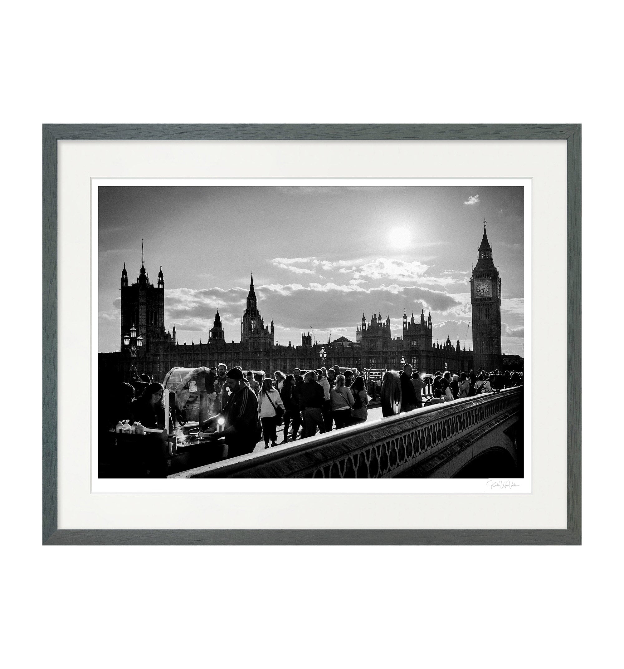  Framed black and white wall art print of Westminster Bridge and Big Ben with street life, grey wooden frame, fine art photography by Kadir Ugur Varli.
