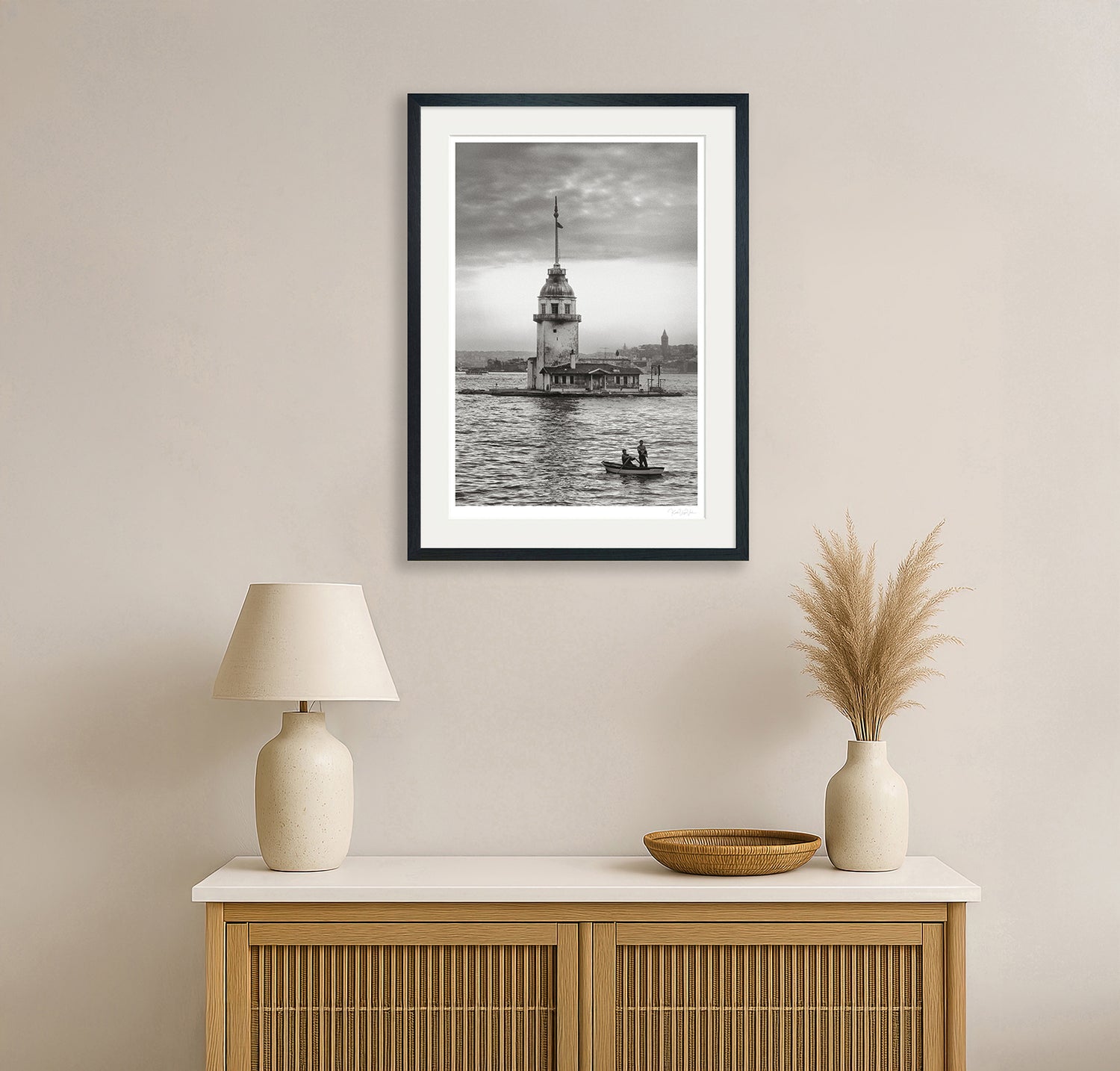 Maiden’s Tower fine art print framed and displayed on a wall above a sideboard in a minimalist room