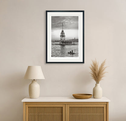 Maiden’s Tower fine art print framed and displayed on a wall above a sideboard in a minimalist room
