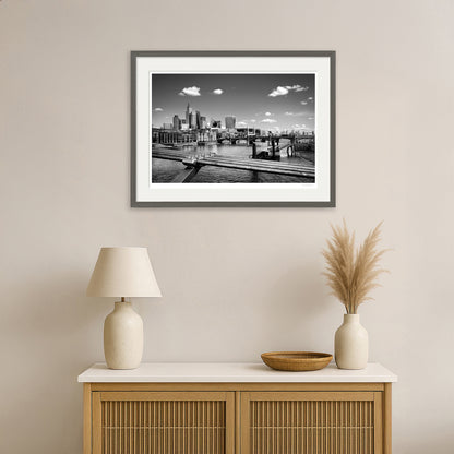 Framed London cityscape wall art showing Thames bridges and contemporary architecture in monochrome style