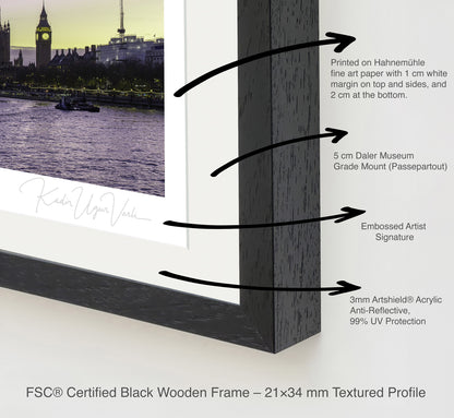 Close-up of FSC-certified black wooden frame with textured profile, anti-reflective acrylic glass, and embossed artist signature on a fine art print.